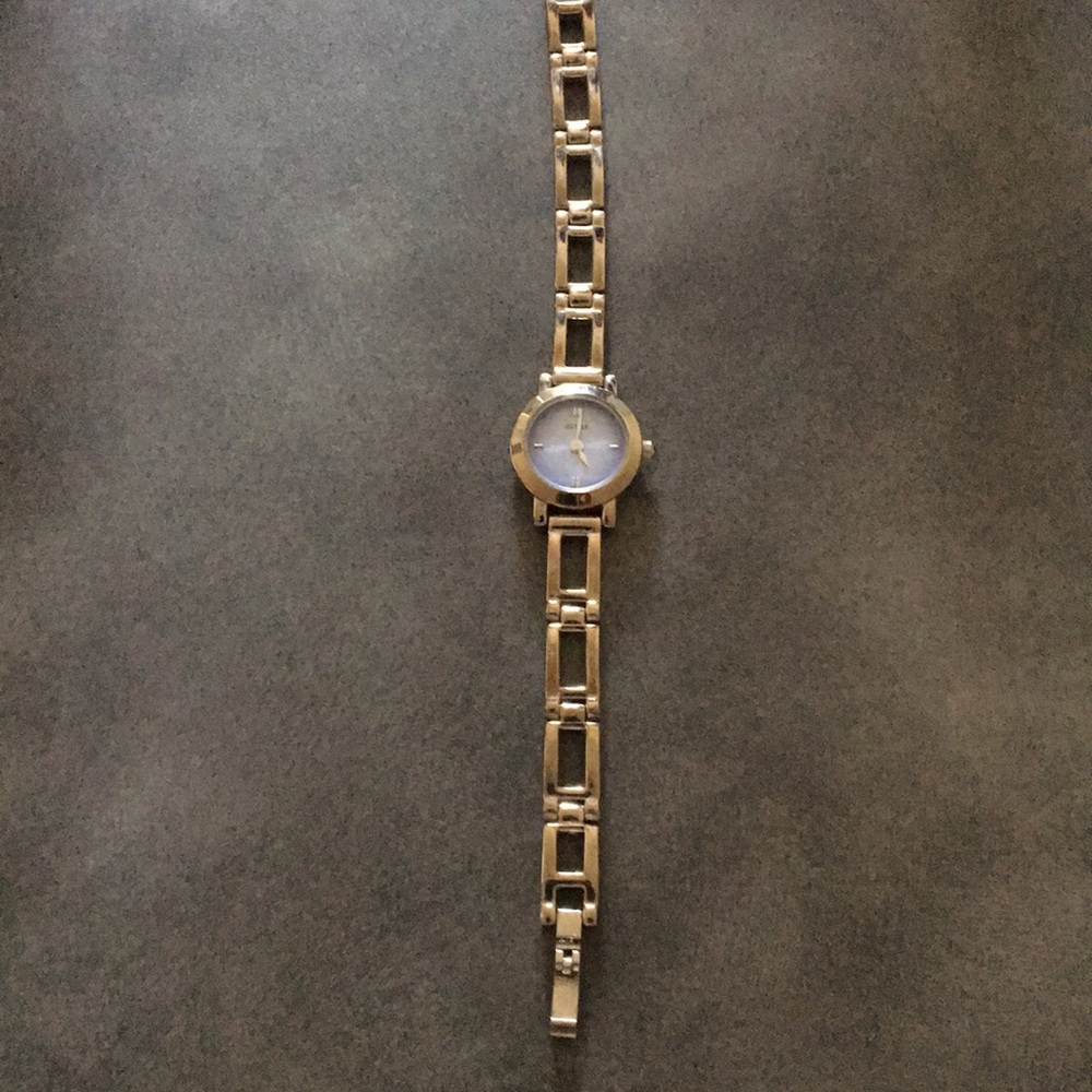 Used Guess thin silver watch with blue dial